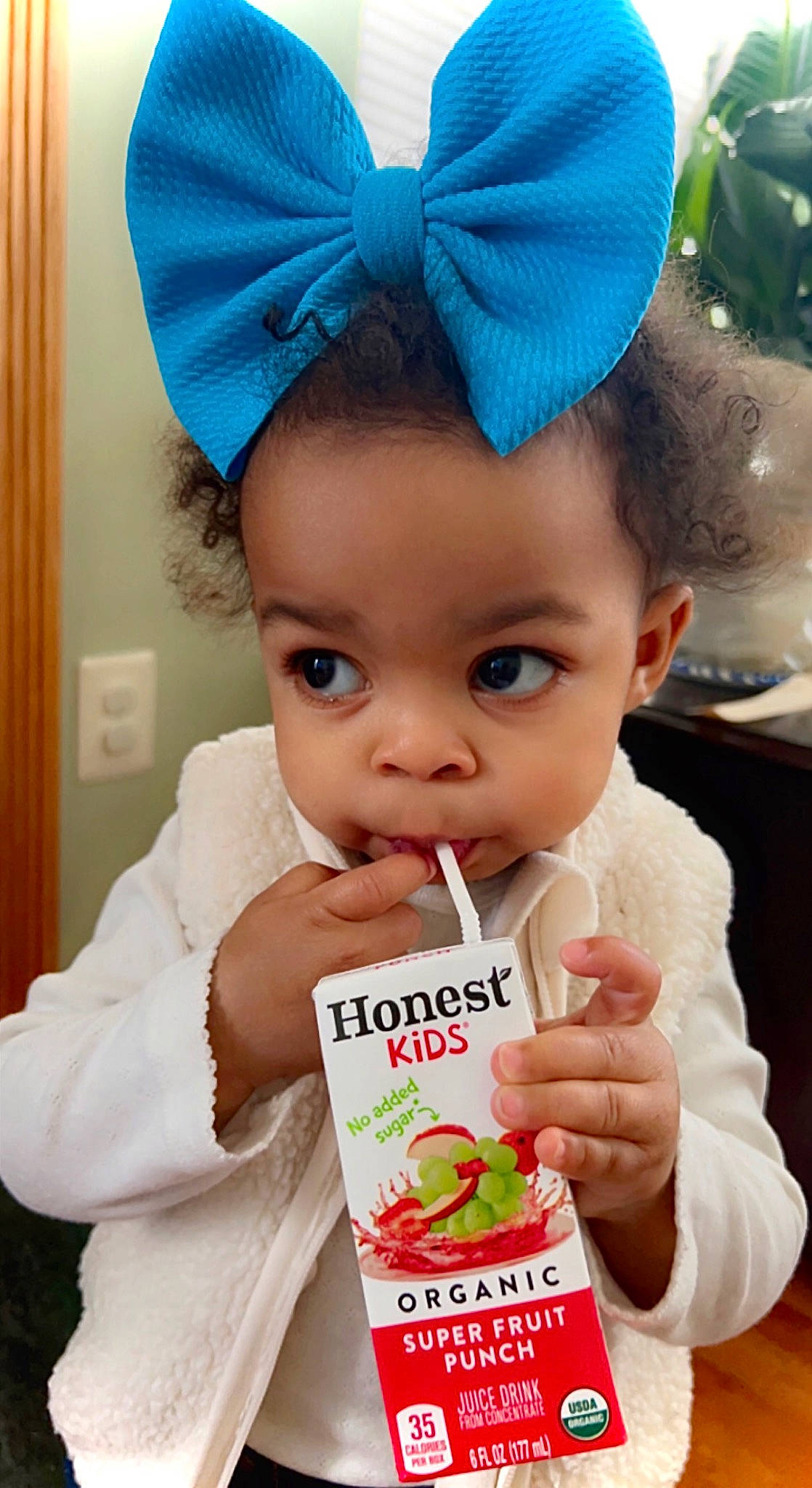 Briella is registered to the contest to win money with this photo: baby, baby_toddler_clothing, beauty, cap, child, costume_hat, drink, electric_blue, fashion_accessory, green, hair_accessory, happy, hat, headpiece, juicebox, natural_foods, person, photograph, product, toddler