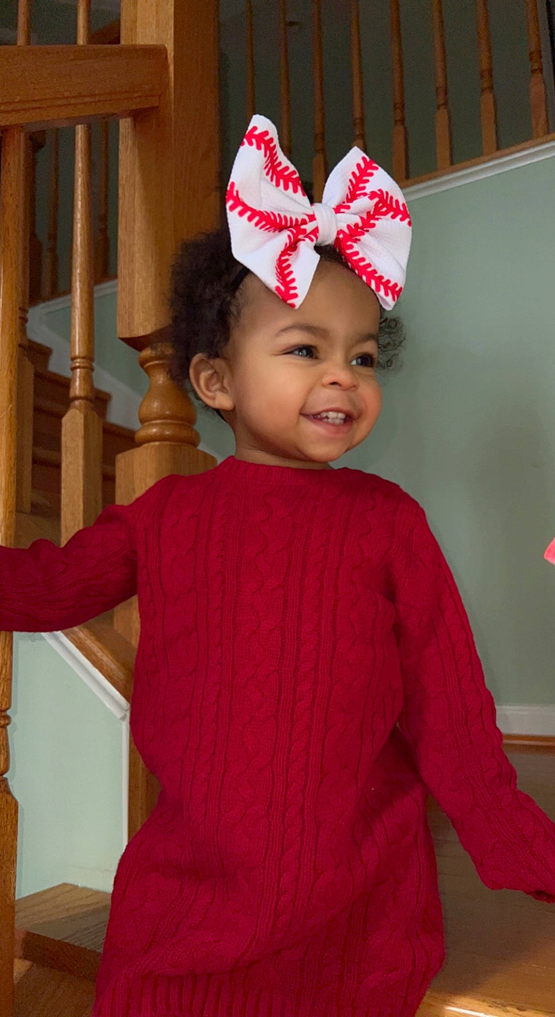 Briella joined the competition — help win amazing prizes! baby_toddler_clothing, child, costume_hat, event, fashion_accessory, fashion_design, fun, hair_accessory, happy, head, headwear, human_body, magenta, neck, person, pink, red, sleeve, smile, standing