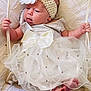 Lynaë participe au concours pour gagner de l'argent avec cette photo : baby, bed, blanket, bonnet, cap, clothing, crib, dress, face, furniture, hat, head, infantbed, newborn, person, photography, portrait, sitting, sleeping, sleeve