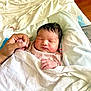 Raikishori is registered to the contest to win money with this photo: newborn, baby, blanket, hand, sleeping, person, skin, bed, hospital, rest, comfort, infant, human, parent, holding, cute, peaceful, soft, closeup, indoors