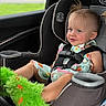 Makayla joined the competition — help win amazing prizes!  안전, baby, buckled, car, car_seat, child, colorful_clothing, dress, fuzzy_slippers, green_slippers, happy, harness, indoor, portrait, sitting, smiling, toddler, travel, vehicle, window
