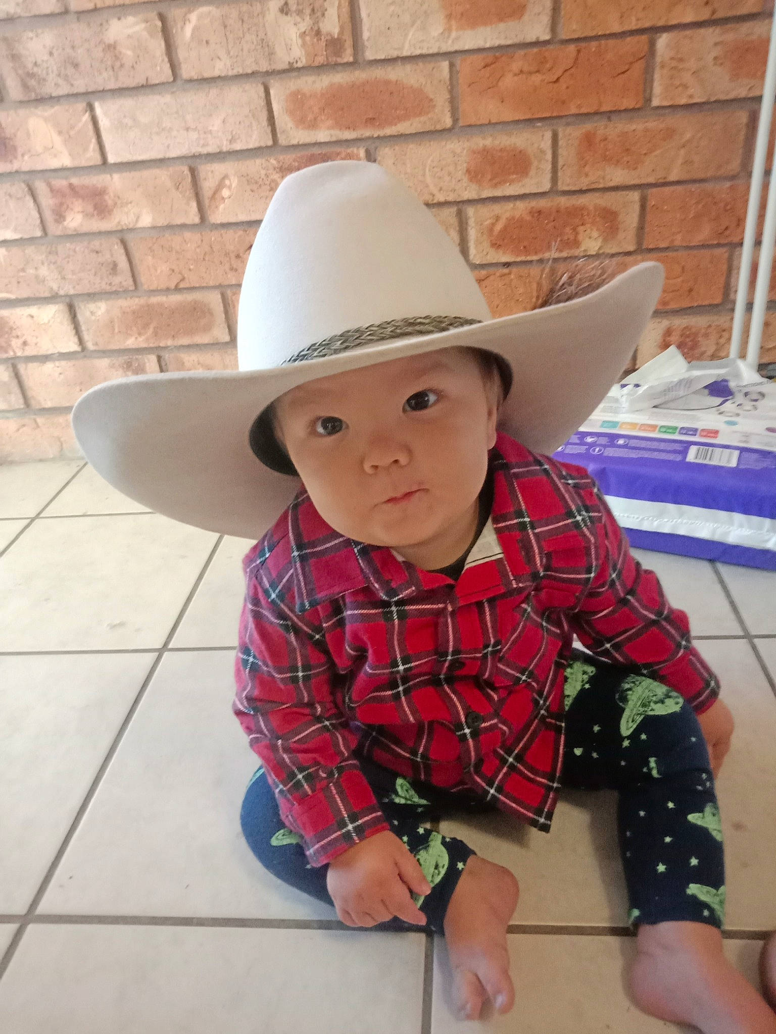 Casey joined the competition — help win amazing prizes! child, clothing, cowboy_hat, design, fashion_accessory, fedora, hat, headgear, headwear, pattern, person, plaid, sun_hat, toddler