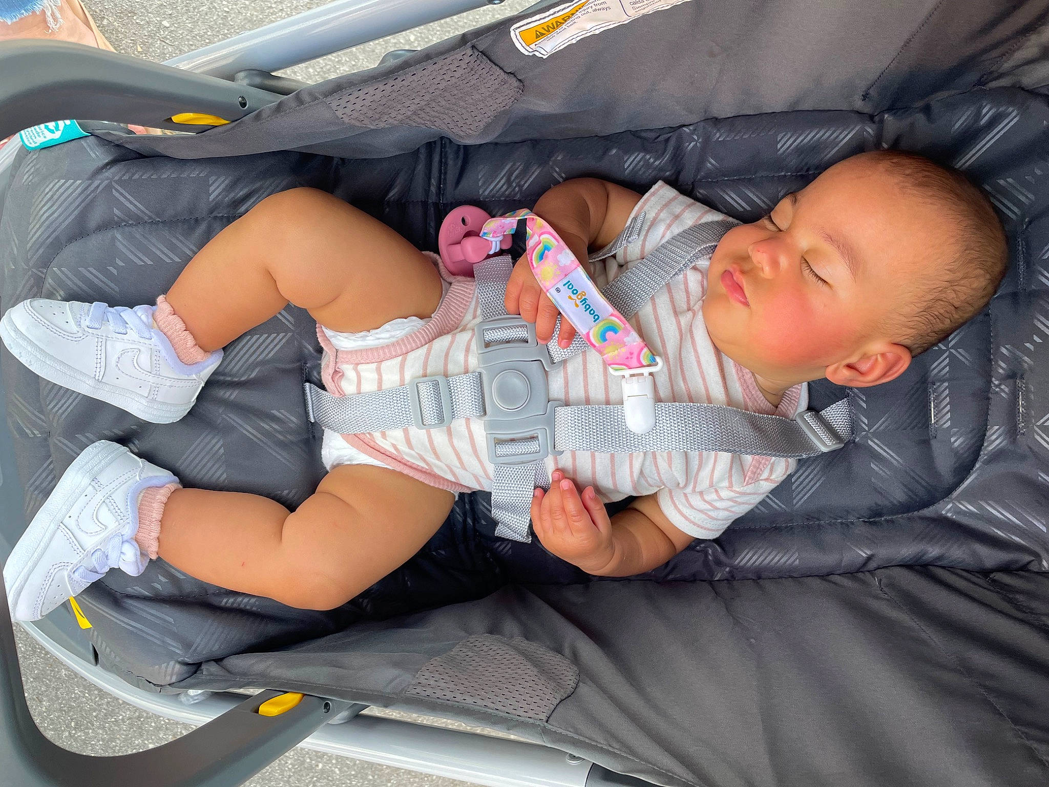 Amiyah joined the competition — help win amazing prizes! automotive_tire, baby, baby_products, baby_toddler_clothing, car_seat, comfort, fender, human_leg, knee, lap, leg, motor_vehicle, person, shorts, sitting, thigh, tire, toddler, vehicle, vehicle_door
