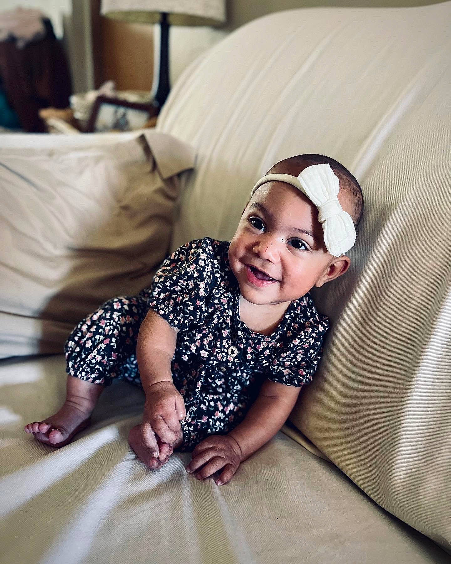 Amiyah is registered to the contest to win money with this photo: black_hair, comfort, elbow, flash_photography, floor, flooring, fun, happy, head, headwear, human_leg, joy, knee, long_hair, neck, person, sitting, sleeve, smile, sportswear