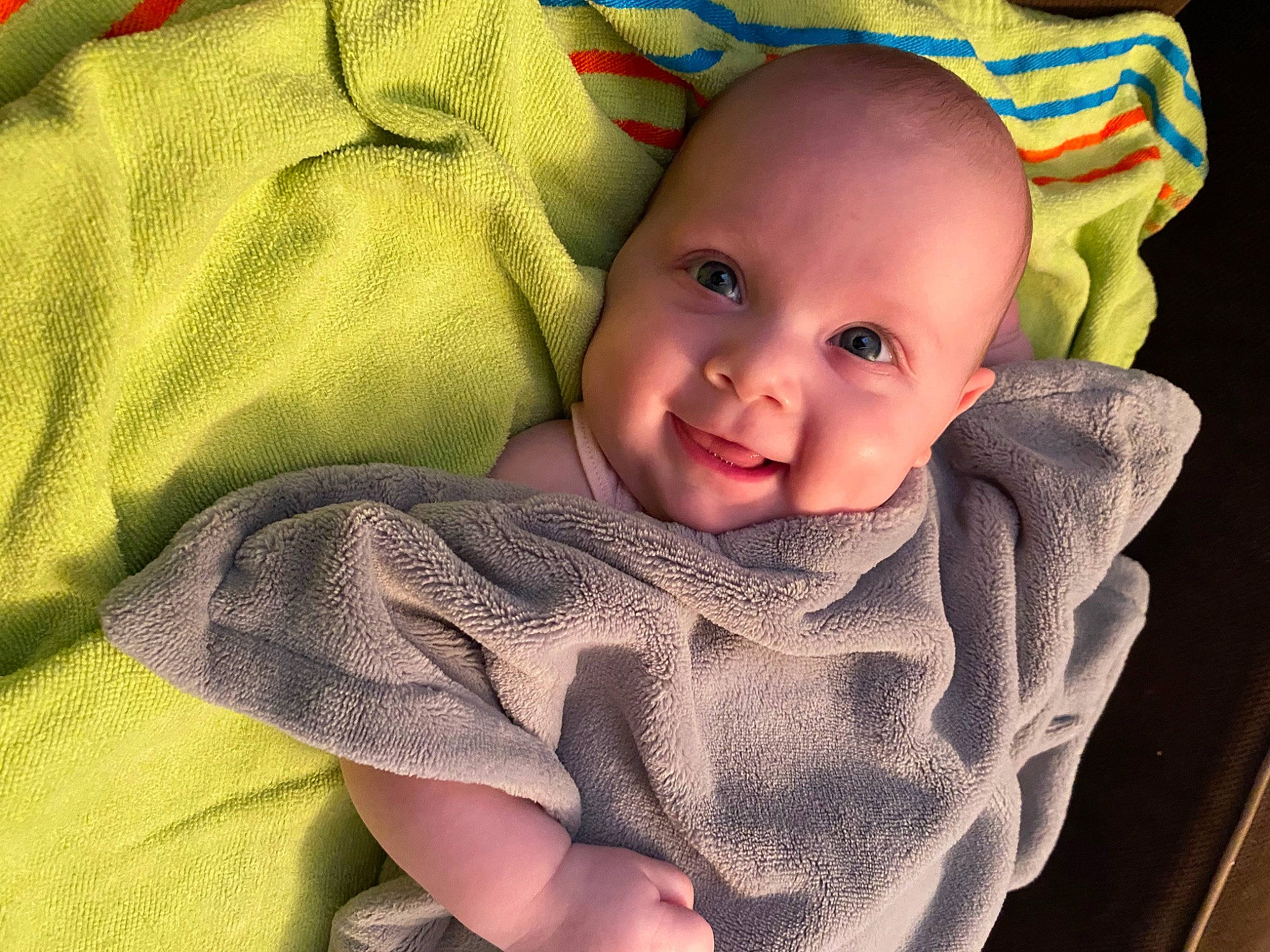 Edith joined the competition — help win amazing prizes! baby, baby_products, baby_toddler_clothing, cheek, child, comfort, finger, happy, iris, linens, lip, mouth, nose, pattern, person, sitting, skin, sleeve, smile, textile