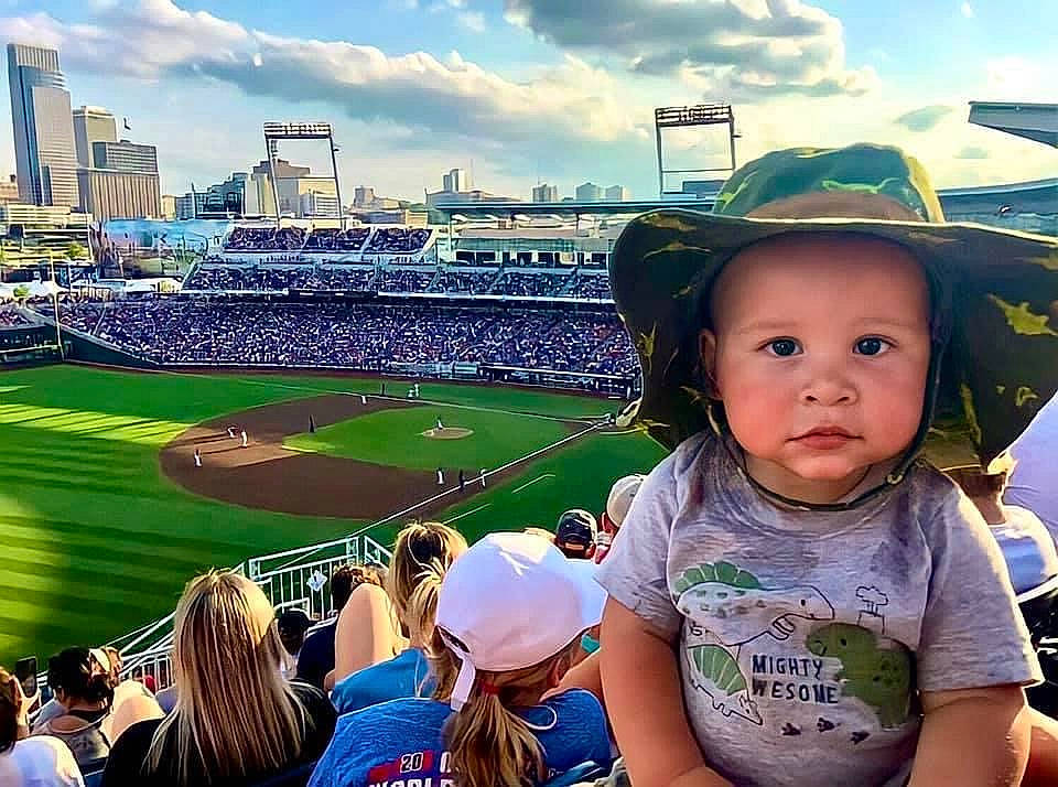 Grady is registered to the contest to win money with this photo: baseball, baseball_cap, baseball_field, baseball_park, cap, cloud, cool, crowd, daytime, fan, grass, green, happy, hat, headwear, leisure, person, player, product, sky