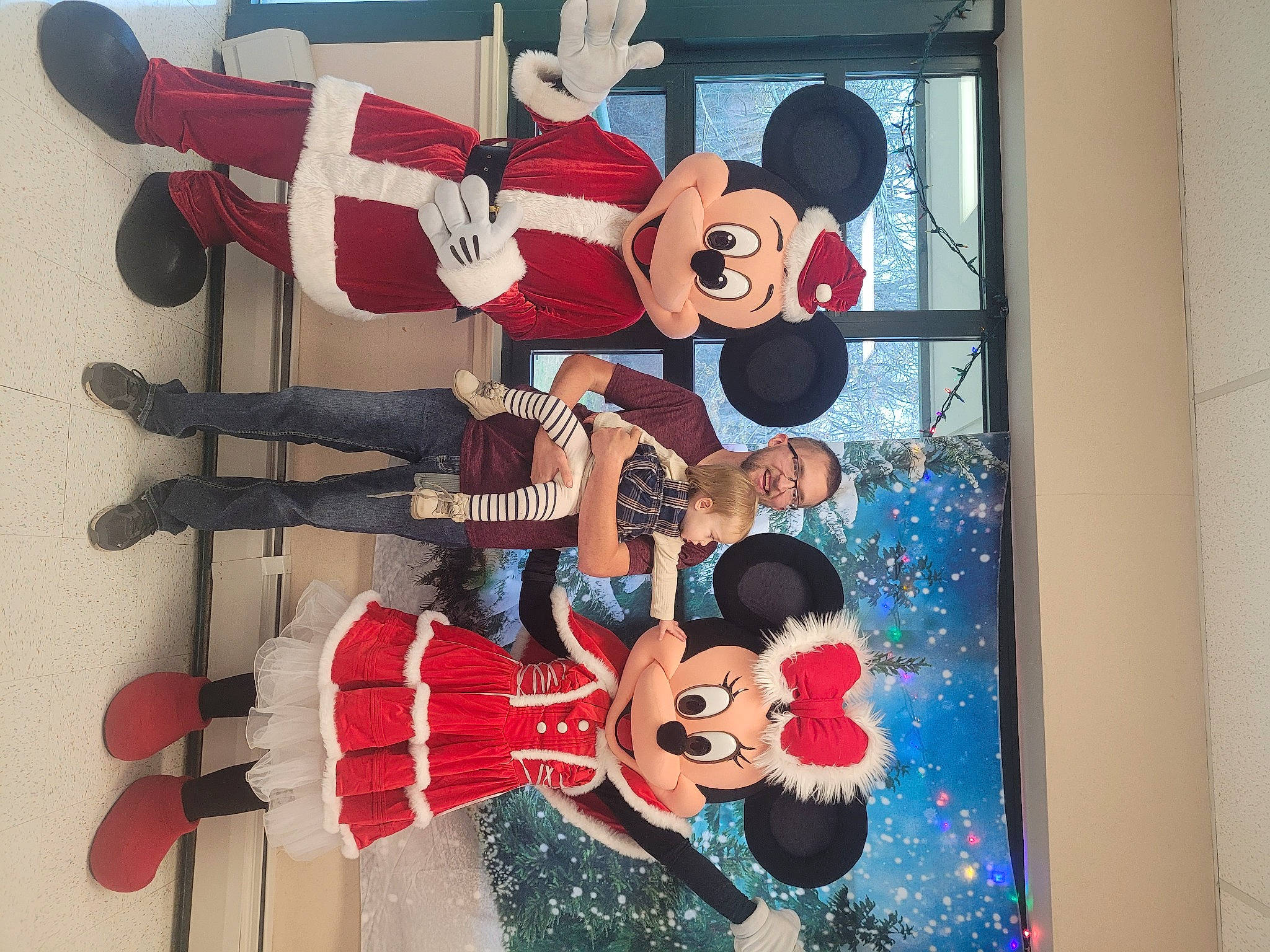 Lindsay joined the competition — help win amazing prizes! animated_cartoon, art, carmine, christmas, christmas_eve, costume, event, fiction, fictional_character, fun, happy, holiday, joy, person, photography, red, room, santa_claus, smile, tree