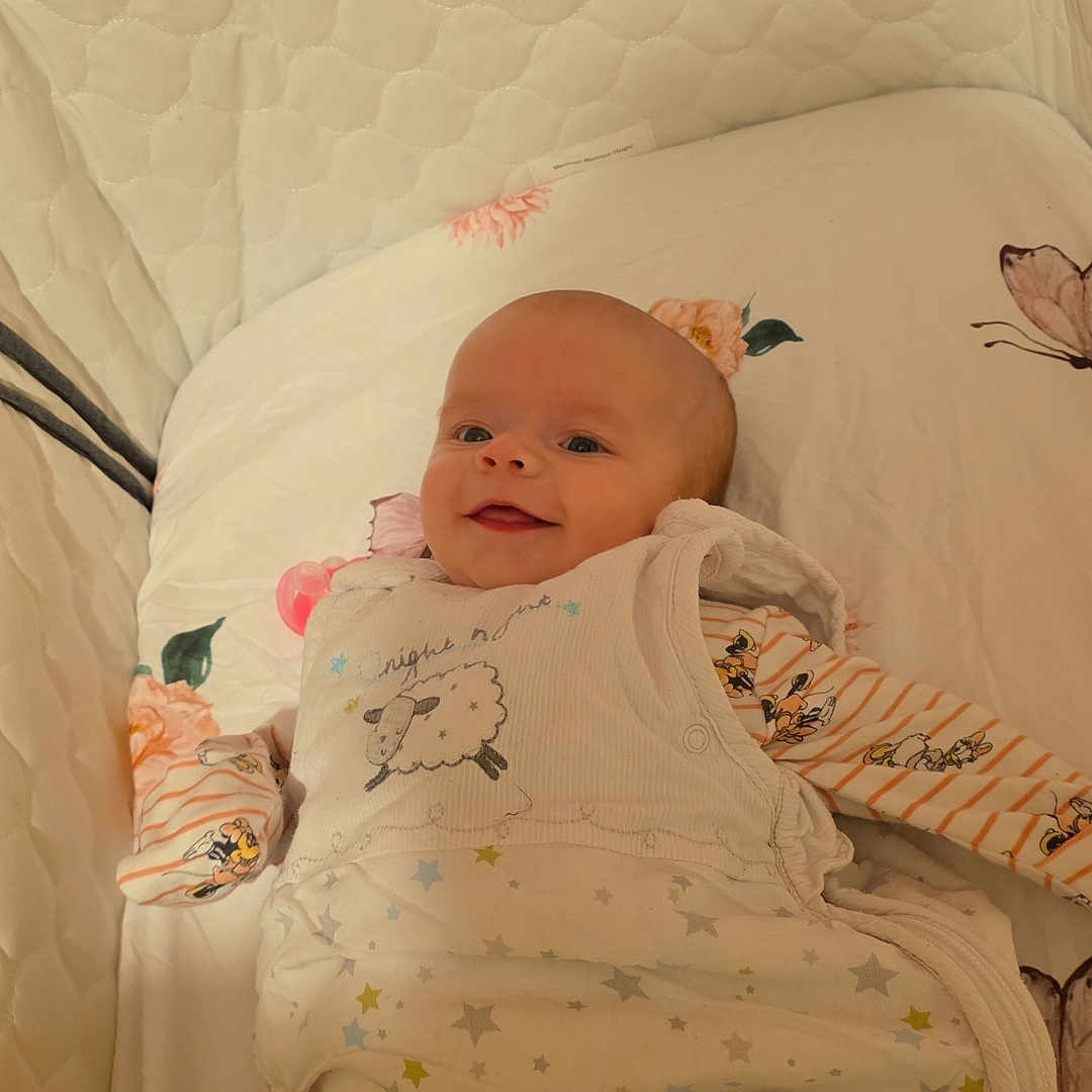 Rhapsody joined the competition — help win amazing prizes! baby, bedding, blanket, butterfly, child, comfort, crib, cute, floral, hand, indoors, infant, pattern, person, quilted, rest, sleepwear, smile, soft, star_pattern