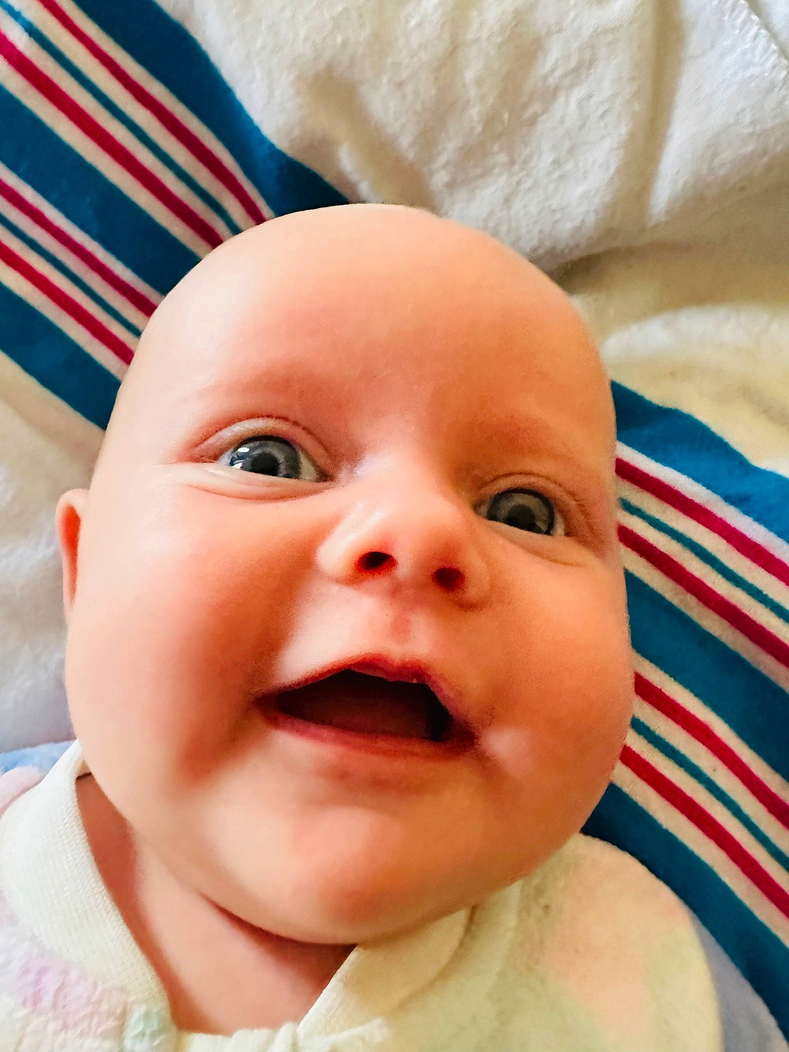 Grace is registered to the contest to win money with this photo: baby, baby_toddler_clothing, cheek, child, chin, comfort, eyebrow, eyelash, fun, gesture, happy, iris, lip, mouth, nose, person, skin, smile, textile, toddler