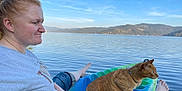 Lyrical joined the competition — help win amazing prizes! woman, cat, kayak, lake, water, nature, outdoor, sky, mountain, relaxing, pet, animal, casual_clothing, summer, daylight, scenic, forest, barefoot, side_view, calm