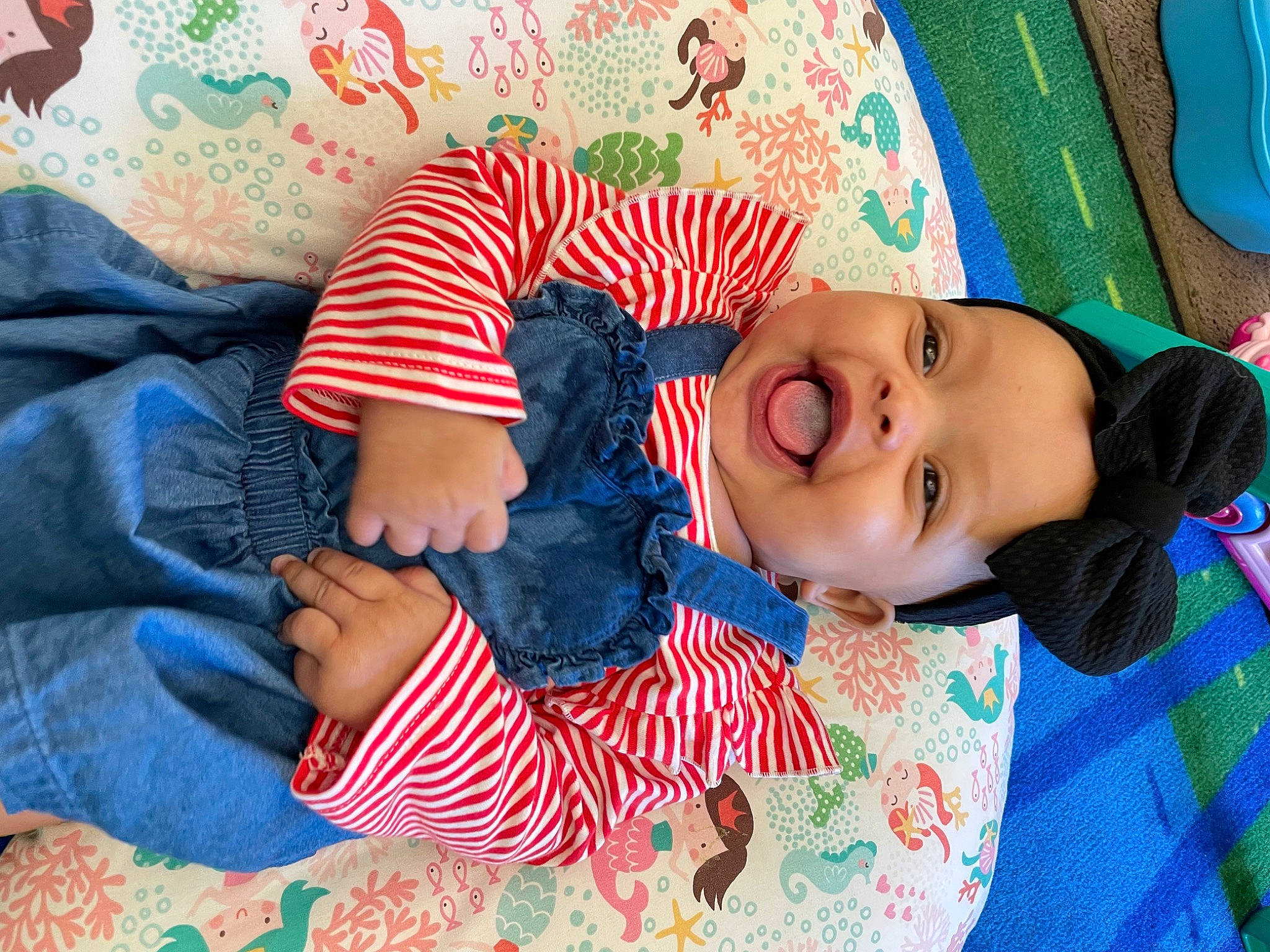 Anniya is registered to the contest to win money with this photo: baby_toddler_clothing, beauty, cheek, child, comfort, cool, green, happy, head, headwear, linens, pattern, person, play, product, room, skin, sleeve, t_shirt, textile