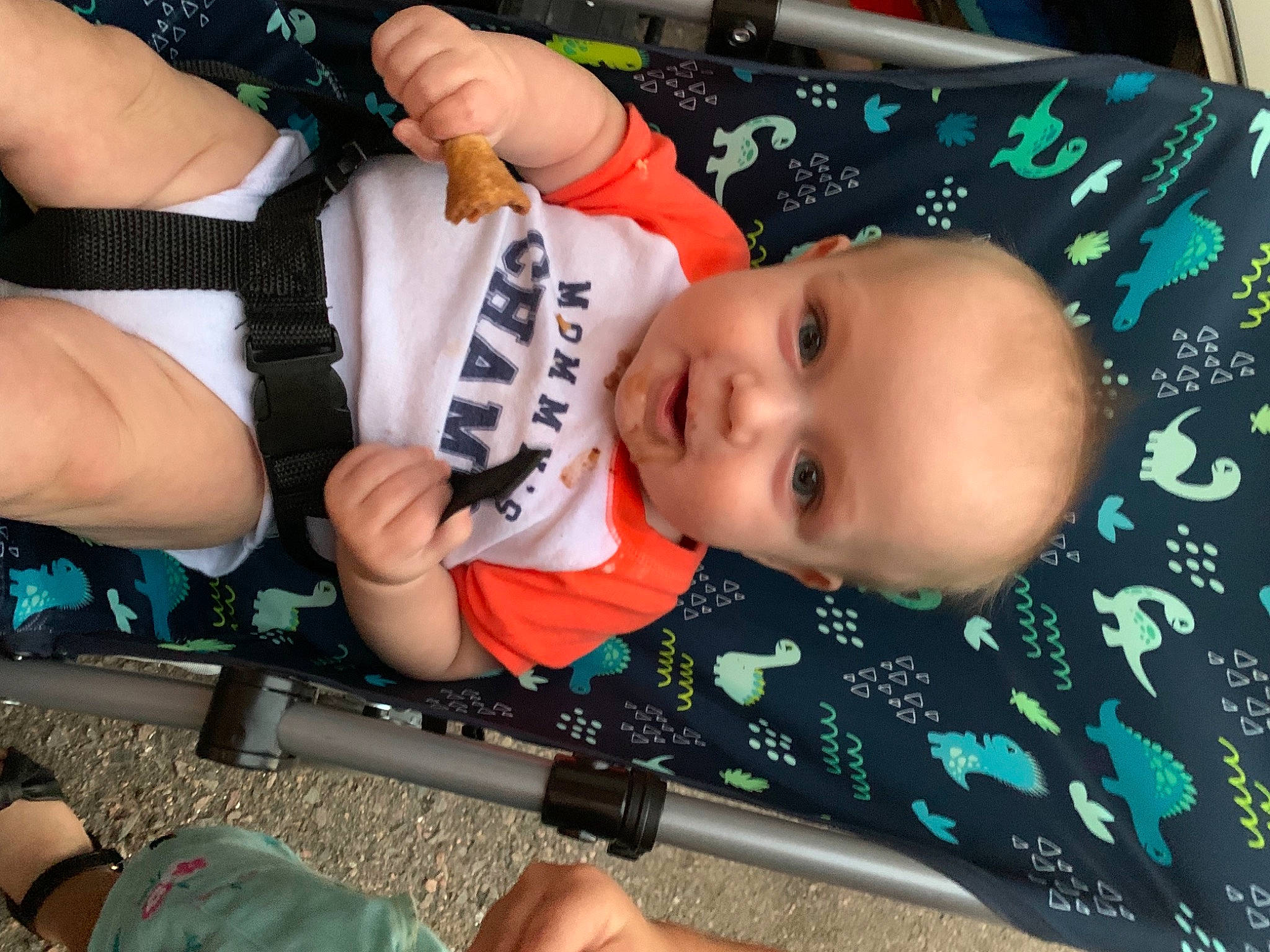 Liam is registered to the contest to win money with this photo: auto_part, baby, baby_carriage, baby_products, baby_toddler_clothing, cheek, child, finger, fun, gesture, happy, organ, pattern, person, shooting, smile, snapshot, thigh, thumb, toddler