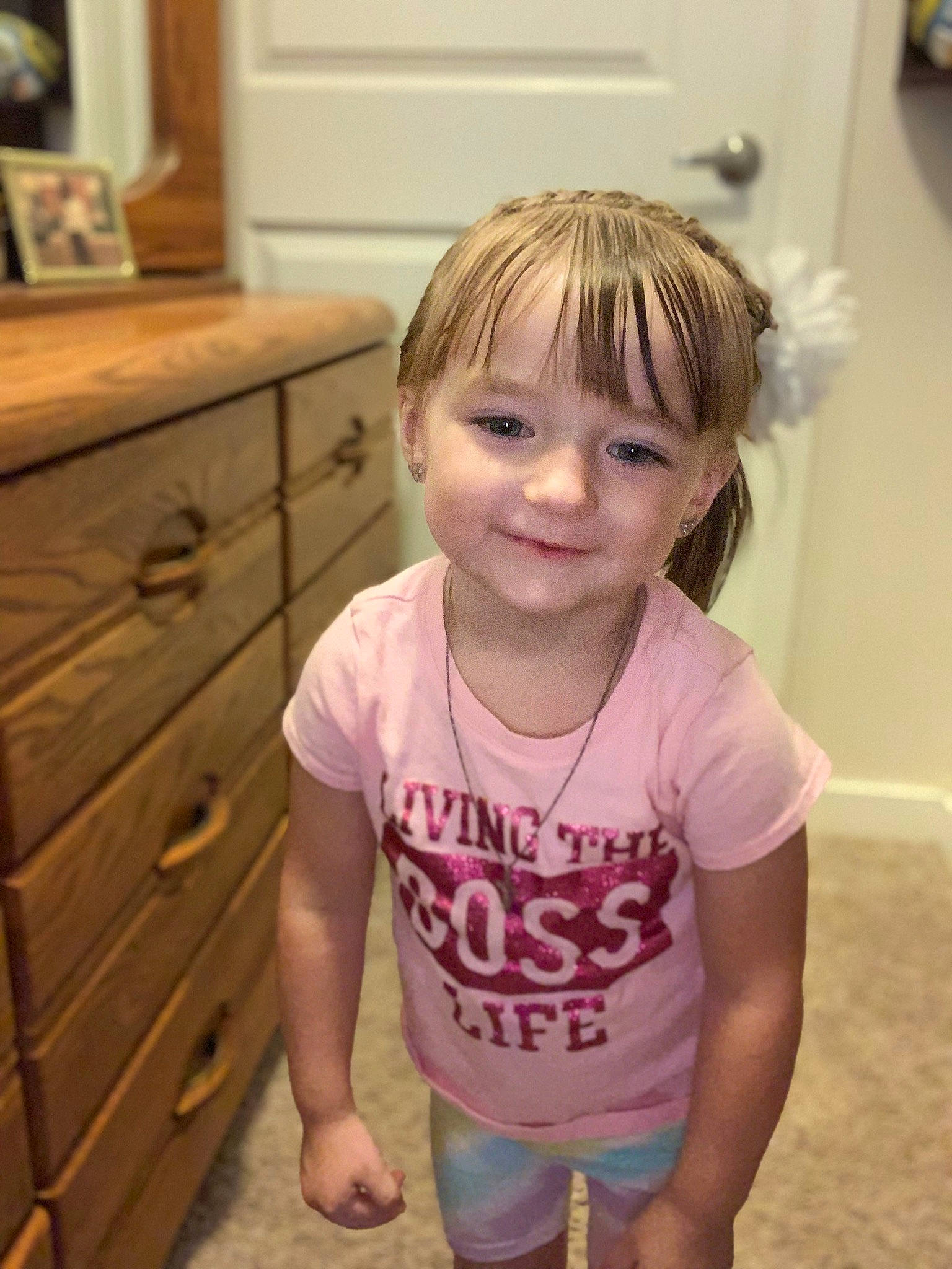 Ezlyn joined the competition — help win amazing prizes! baby_toddler_clothing, cabinetry, chin, drawer, dresser, facial_expression, floor, flooring, happy, iris, joy, person, picture_frame, pink, shoulder, sleeve, smile, standing, t_shirt, toddler