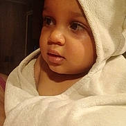 Karter is registered to the contest to win money with this photo: child, baby, towel, hood, face, portrait, skin, eyes, expression, warm, cozy, soft, indoor, close-up, cute, young, person, infant, wrapped, thoughtful