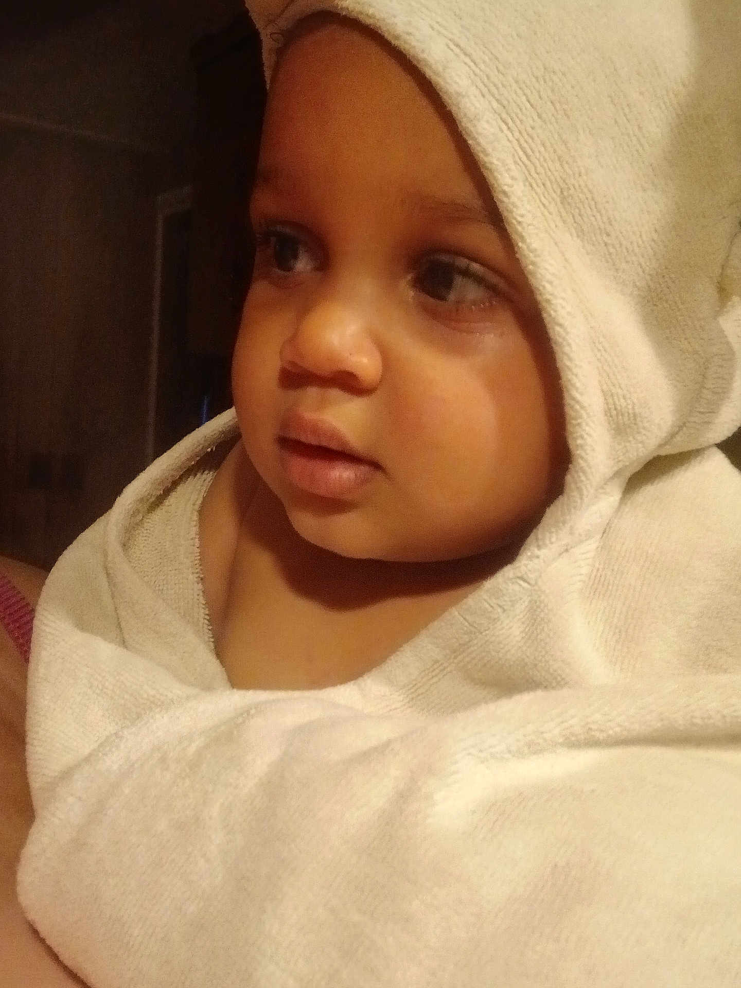 Karter is registered to the contest to win money with this photo: child, baby, towel, hood, face, portrait, skin, eyes, expression, warm, cozy, soft, indoor, close-up, cute, young, person, infant, wrapped, thoughtful
