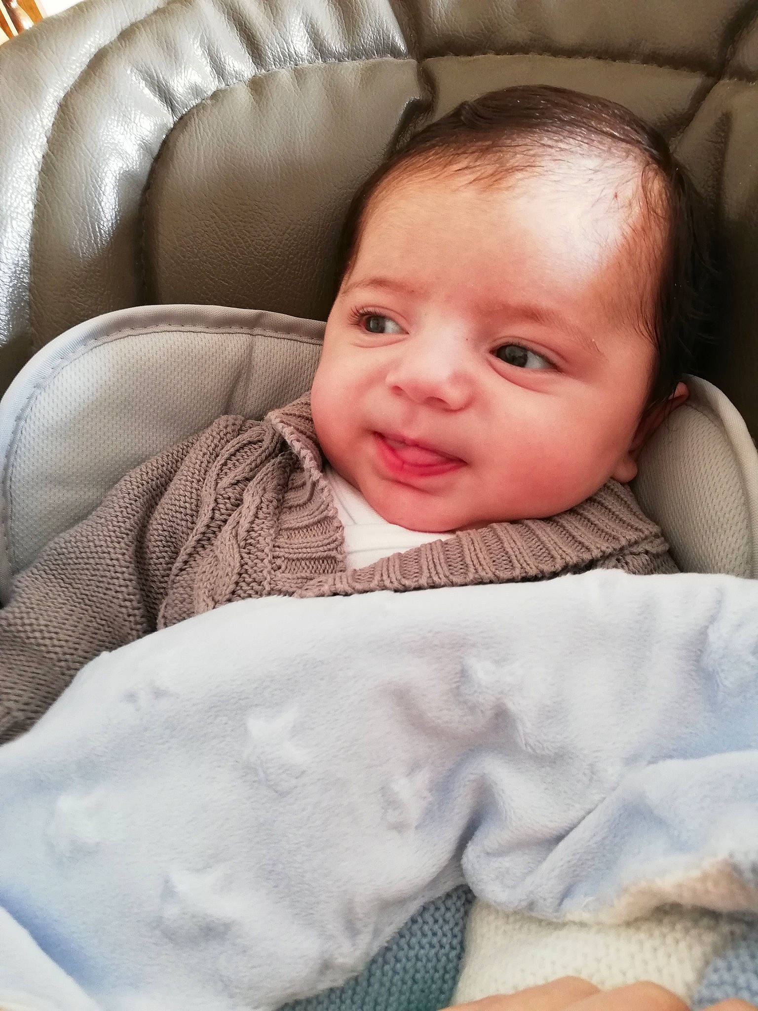 Joshua a rejoint le concours — aidez-le/la à gagner de superbes lots ! baby, baby_products, baby_toddler_clothing, blanket, cheek, child, comfort, couch, eyebrow, eyelash, linens, person, skin, toddler