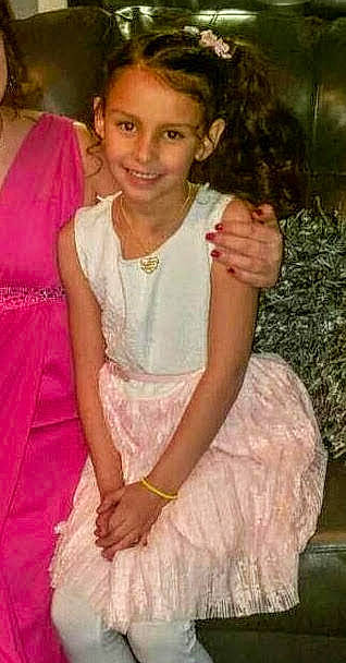 Audriana is registered to the contest to win money with this photo: child, child_model, daughter, dress, fashion, formal_wear, hair, hairstyle, joy, lady, long_hair, person, pink, smile