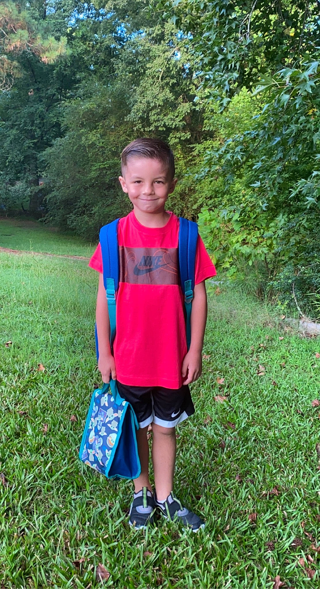 Kason joined the competition — help win amazing prizes! baby_toddler_clothing, bag, electric_blue, fun, grass, grassland, green, joy, leisure, luggage_and_bags, outerwear, pattern, people_in_nature, person, plant, recreation, shorts, sleeve, t_shirt, toddler