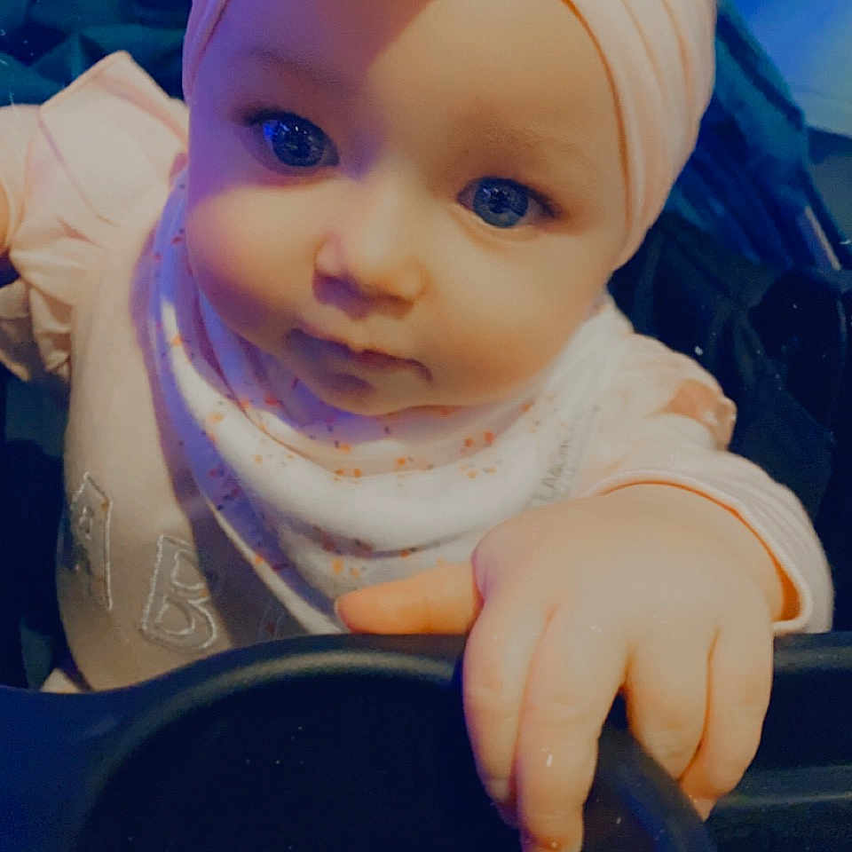Kyleigh joined the competition — help win amazing prizes! baby, baby_toddler_clothing, cap, cheek, child, dishware, drinkware, electric_blue, eye, finger, hand, happy, hat, headgear, lip, mouth, nose, pink, serveware, toddler