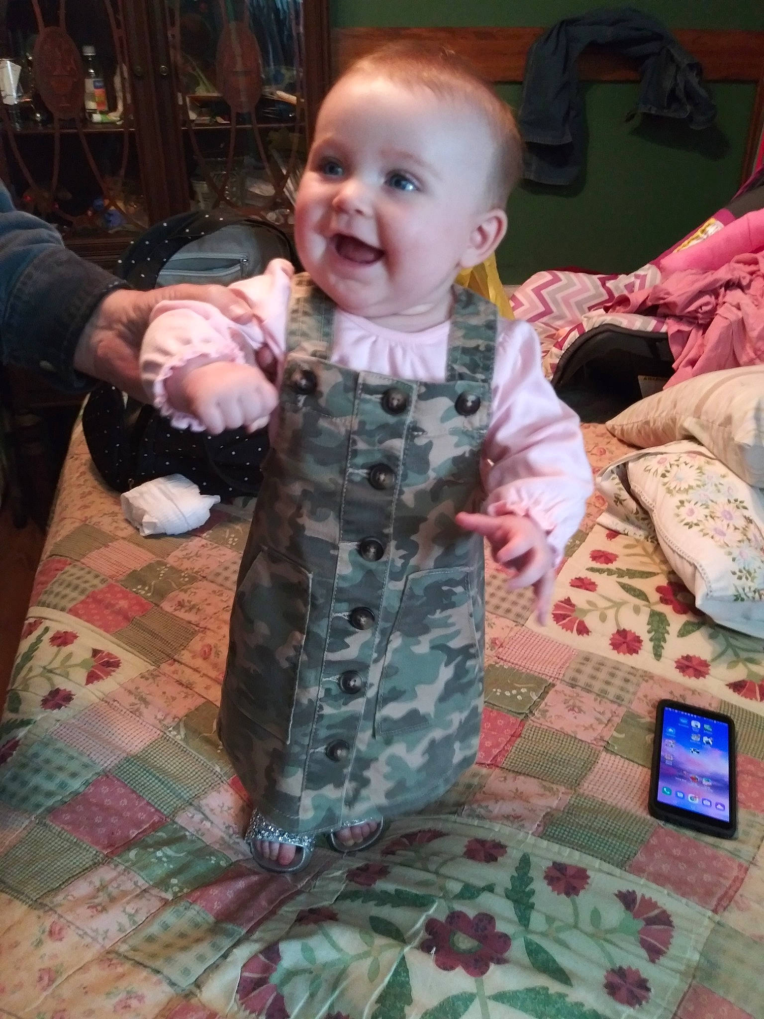 Kenzie joined the competition — help win amazing prizes! baby, baby_toddler_clothing, bag, chair, child, event, floor, flooring, fun, happy, head, luggage_and_bags, military_camouflage, pattern, person, play, skin, sleeve, smile, textile