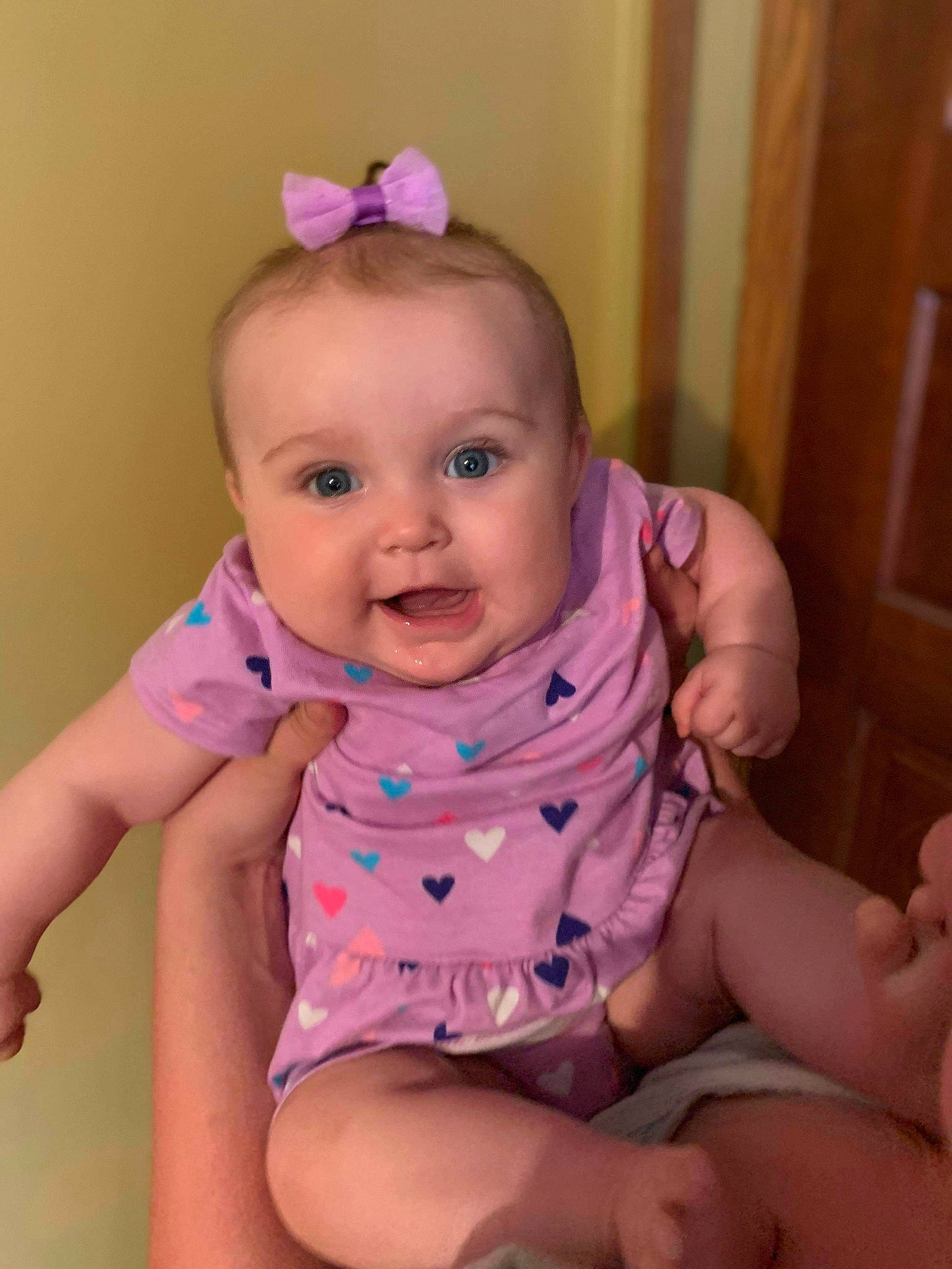 Kenzie joined the competition — help win amazing prizes! baby, baby_toddler_clothing, cheek, chin, eye, face, facial_expression, finger, head, iris, leg, neck, person, pink, product, purple, skin, sleeve, smile, stomach