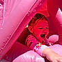 toddler, child, inflatable, pink, water_droplets, play, joy, happy, summer, outdoor, fun, wet_hair, sleepsuit, reach, smile, person, inflatable_pool, playtime, cute, excitement