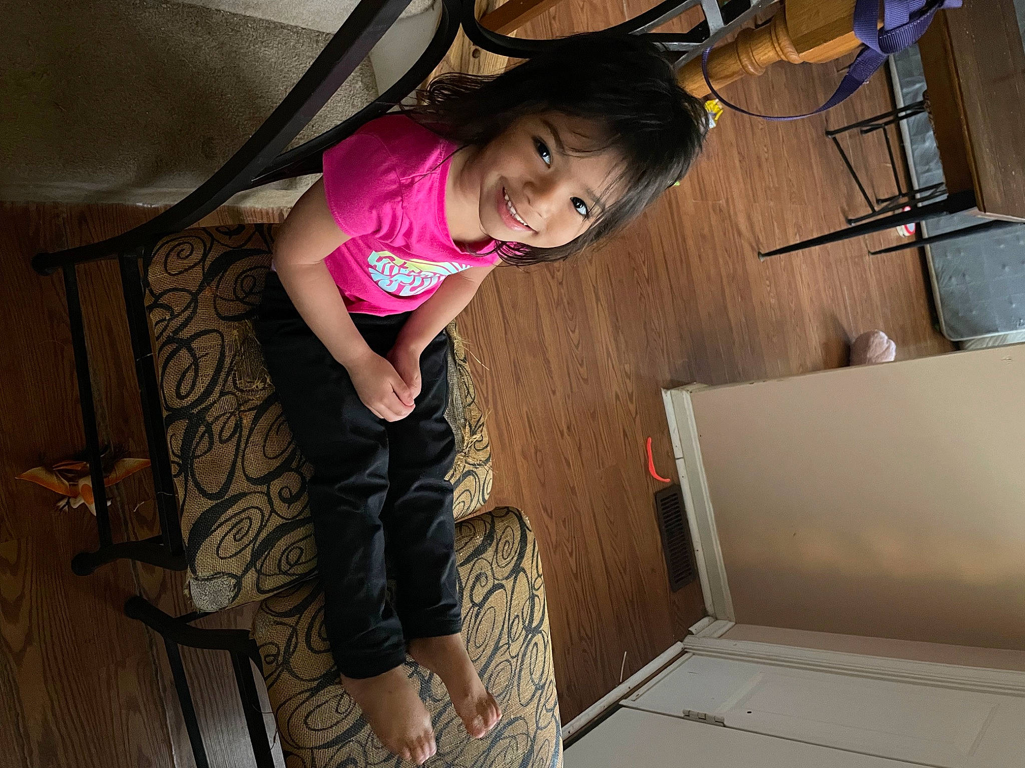 Chloe joined the competition — help win amazing prizes! child, elbow, floor, flooring, foot, fun, hardwood, human_leg, joint, joy, knee, leg, magenta, person, sandal, shorts, sneakers, t_shirt, thigh, toddler