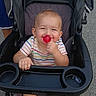baby, child, clothing, colorful, cute, daylight, fun, happy, lollipop, outdoor, people, person, playful, seat, smiling, stroller, summer, toddler, toy, young