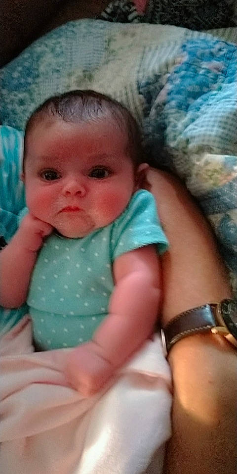 Elodie joined the competition — help win amazing prizes! azure, baby, baby_toddler_clothing, cheek, chest, child, comfort, eye, finger, happy, iris, linens, mouth, nose, pattern, person, sitting, skin, thumb, toddler