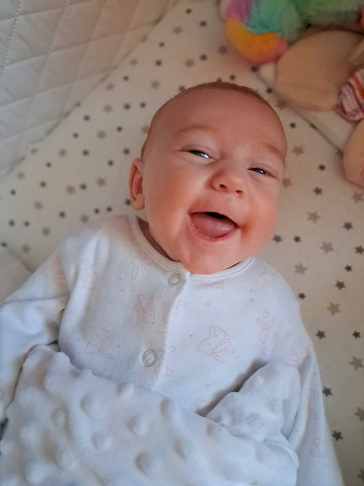 Maddison is registered to the contest to win money with this photo: baby, baby_toddler_clothing, cheek, chin, collar, comfort, dress, happy, head, iris, linens, lip, mouth, nose, person, pink, skin, sleeve, smile, textile