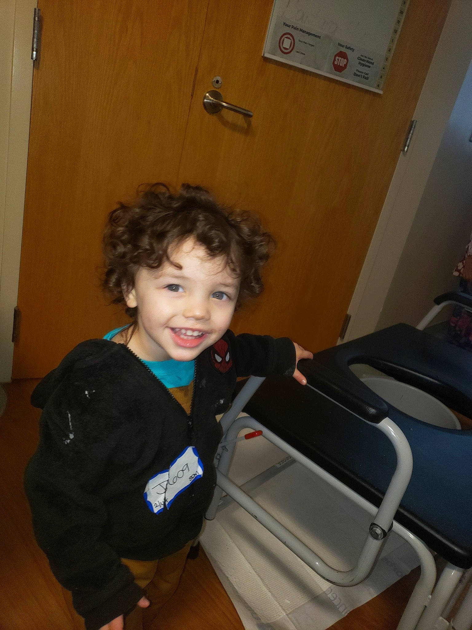 Jodie joined the competition — help win amazing prizes! bag, baggage, child, comfort, flooring, fun, hairstyle, happy, joy, luggage_and_bags, person, room, shoulder, sitting, smile, toddler, travel, vacation, wood