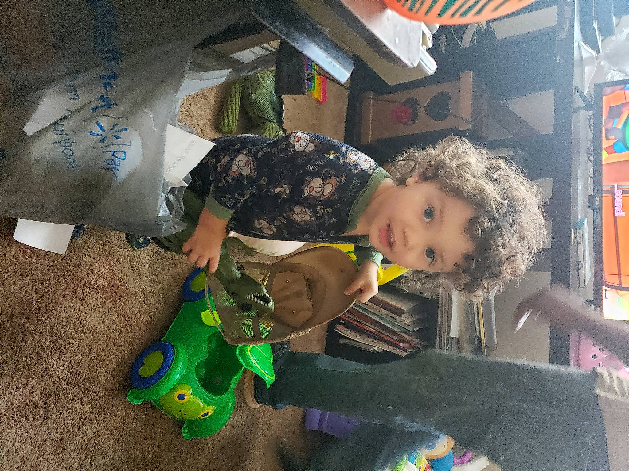 Jodie joined the competition — help win amazing prizes! baby_toys, child, fun, leisure, musical_instrument, person, personal_protective_equipment, plastic, play, recreation, room, sitting, toddler, toy, toy_vehicle, travel, visual_arts