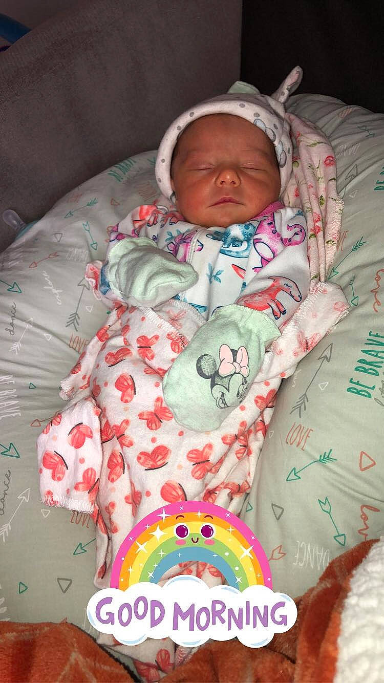 Emberleigh is registered to the contest to win money with this photo: baby, baby_products, baby_sleeping, baby_toddler_clothing, bedding, bedtime, cheek, child, comfort, face, head, linens, mouth, person, pink, product, room, skin, sleeve, textile