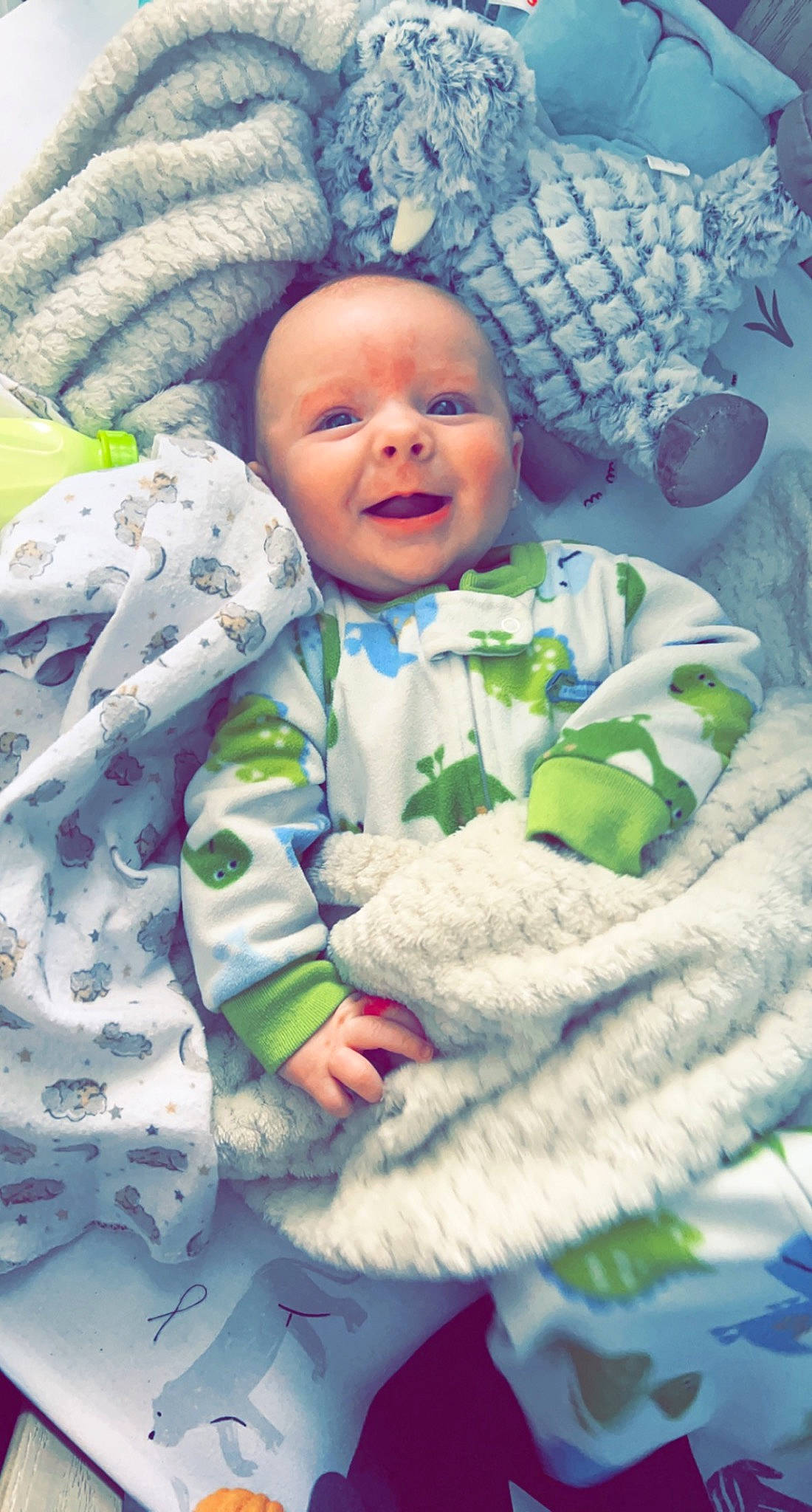 Benjamin joined the competition — help win amazing prizes! baby, baby_products, baby_toddler_clothing, cheek, child, comfort, fun, grass, happy, hat, linens, pattern, person, portrait_photography, room, sitting, skin, sleeve, smile, textile