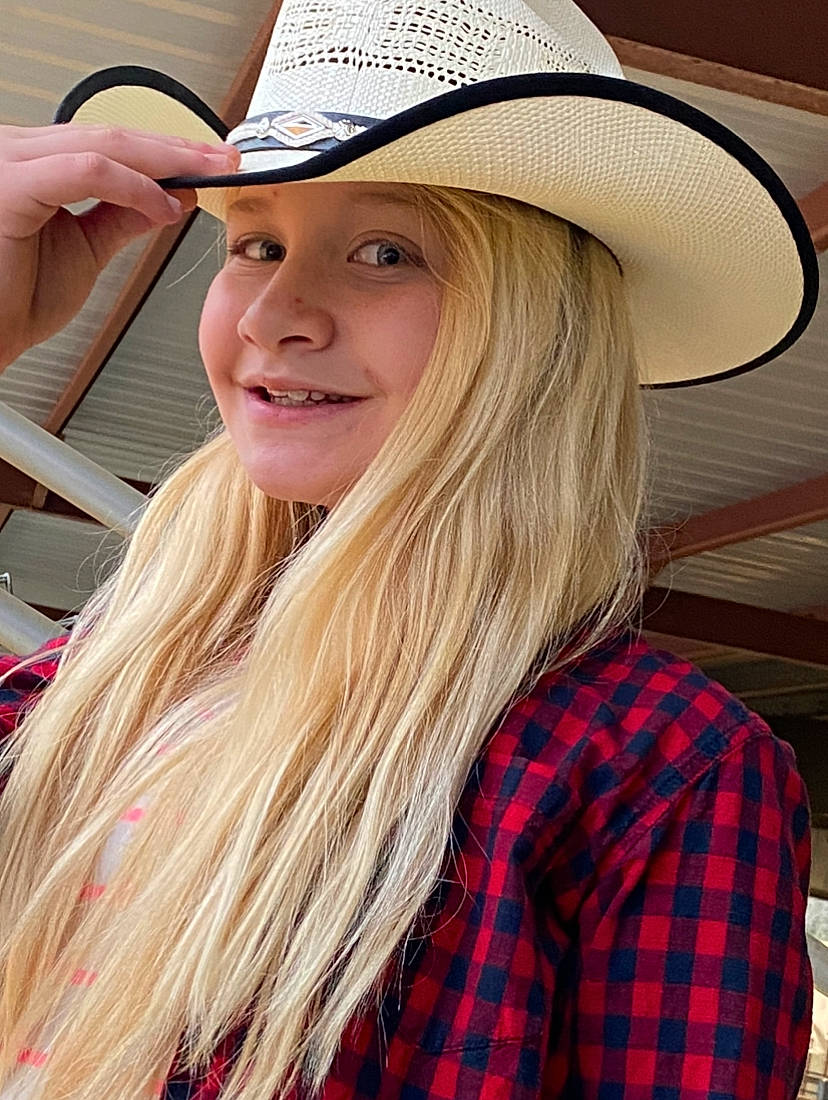Alyssa is registered to the contest to win money with this photo: beauty, blond, blue, cap, cowboy_hat, electric_blue, happy, hat, headgear, headwear, joy, layered_hair, lip, long_hair, pattern, person, plaid, sleeve, smile, street_fashion