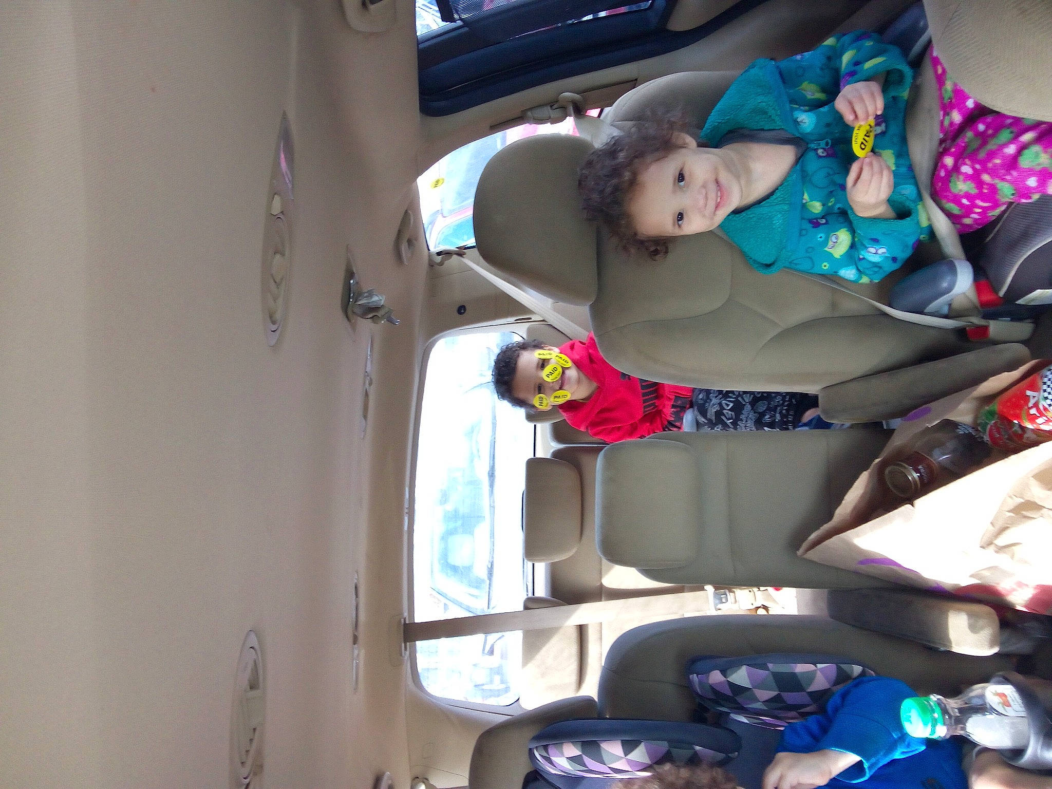 Jazzmyne is registered to the contest to win money with this photo: auto_part, automotive_design, automotive_exterior, automotive_wheel_system, baby, blue, car_seat, carmine, comfort, dress, family_car, fictional_character, fun, joy, machine, motor_vehicle, person, tire, toddler, vehicle