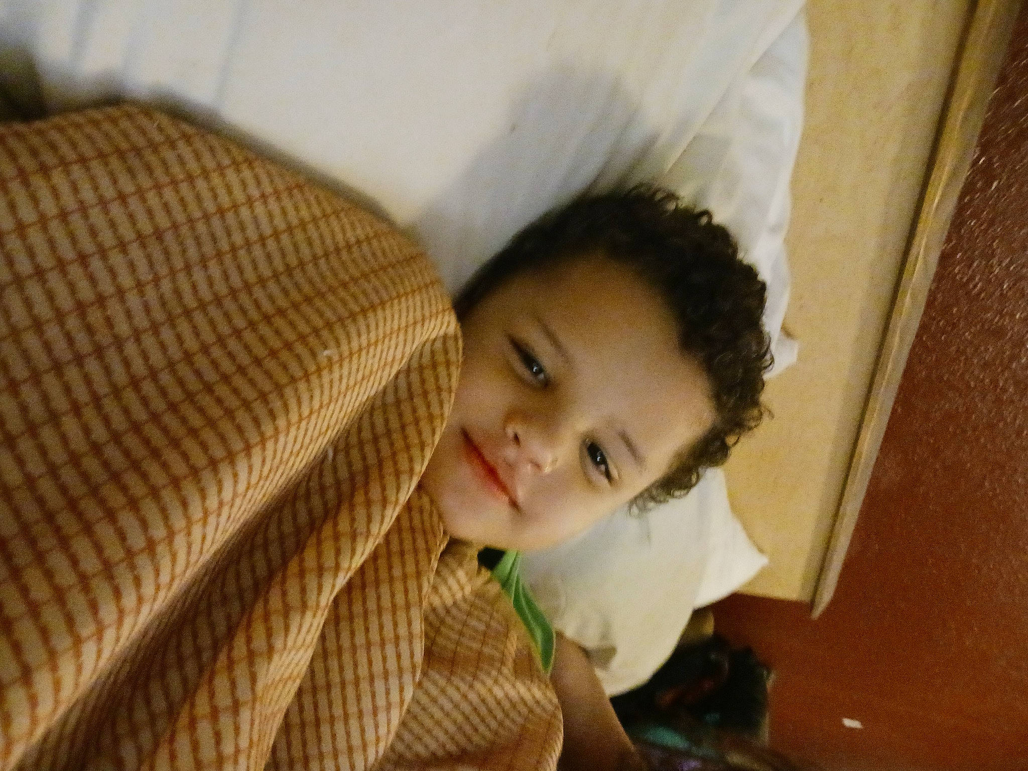 Jace is registered to the contest to win money with this photo: baby, baby_toddler_clothing, cheek, child, comfort, ear, eyelash, flooring, fun, happy, hardwood, linens, nose, person, room, sitting, toddler, wood, woolen