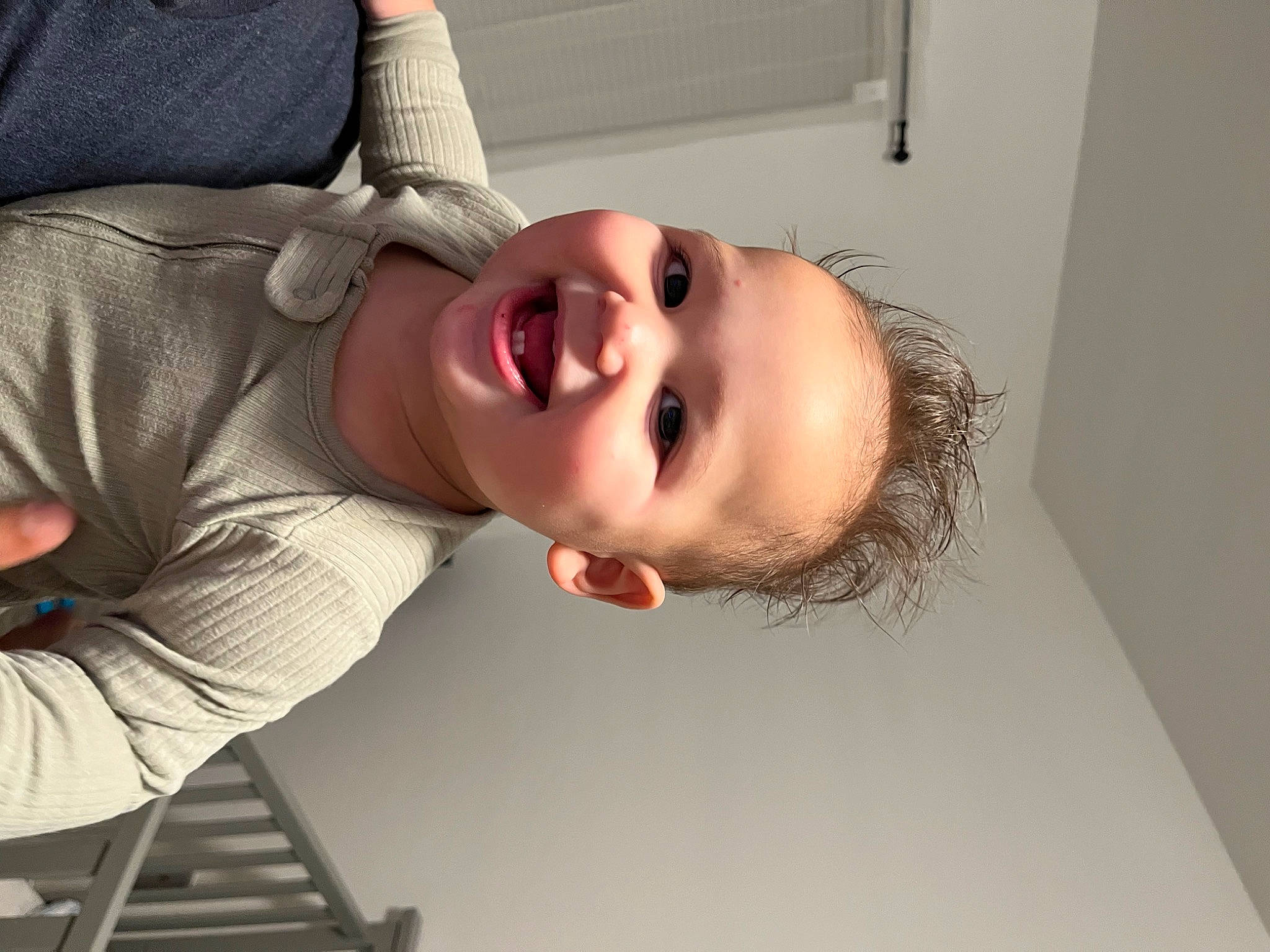 Tobias is registered to the contest to win money with this photo: baby, cheek, comfort, elbow, eyebrow, eyelash, finger, flash_photography, happy, human_body, jaw, joy, lip, mouth, neck, nose, person, shoulder, skin, sleeve