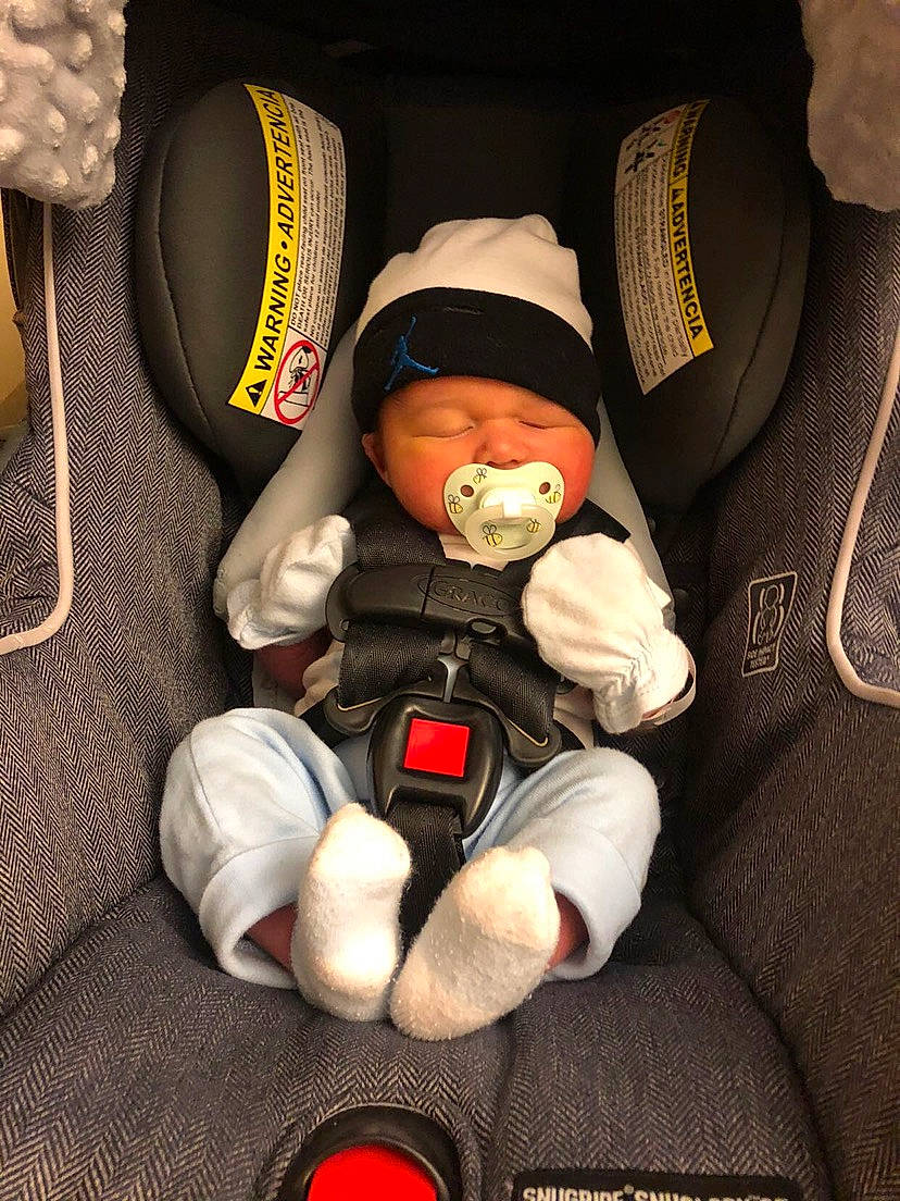 Korbyn joined the competition — help win amazing prizes! auto_part, baby, baby_carriage, baby_in_car_seat, baby_products, baby_safety, baby_sleeping, car_seat, cheek, comfort, finger, headwear, human_body, lap, mouth, nail, person, seat_belt, textile, thumb