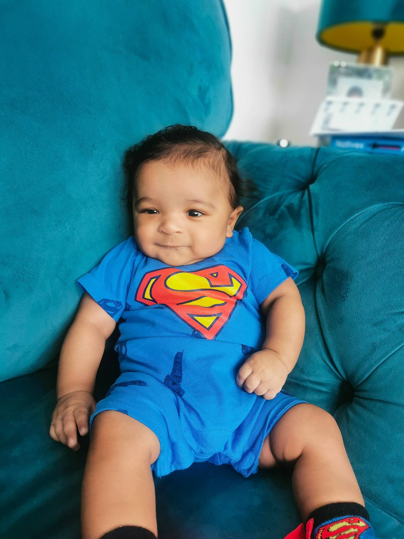 Zaki joined the competition — help win amazing prizes! aqua, arm, azure, baby_toddler_clothing, black, blue, cheek, comfort, eye, facial_expression, happy, iris, leg, mouth, orange, person, skin, smile, standing, textile