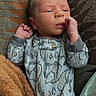 Beau joined the competition — help win amazing prizes! baby, newborn, infant, onesie, hedgehog_pattern, blanket, brown_throw, texture, cute, sleepwear, lying_down, face, hand, curious, indoors, soft_lighting, cozy, child, skin, portrait