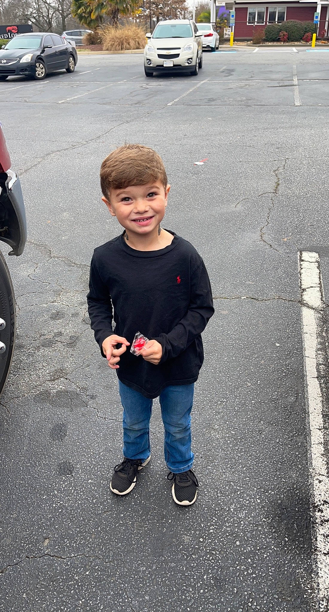 Hunter joined the competition — help win amazing prizes! asphalt, automotive_design, automotive_exterior, automotive_lighting, automotive_tire, black, bumper, car, gesture, infrastructure, joy, motor_vehicle, parking, person, personal_luxury_car, road, road_surface, sidewalk, tire, vehicle_door