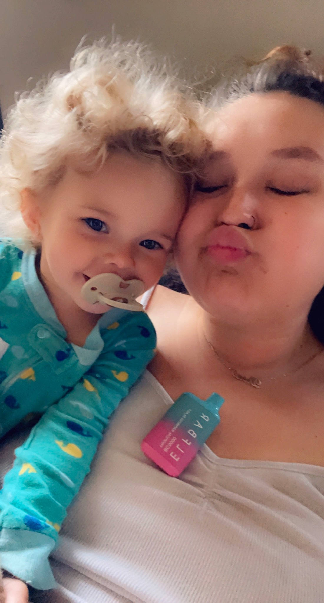 River joined the competition — help win amazing prizes! baby_toddler_clothing, cheek, dress, eye, eyelash, facial_expression, finger, fun, gesture, hair, hairstyle, happy, human, interaction, iris, lip, mouth, nose, person, pink
