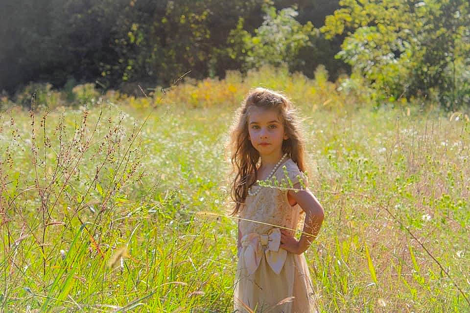Tessa joined the competition — help win amazing prizes! dress, fawn, flower, grass, grass_family, grassland, happy, landscape, leaf, long_hair, meadow, morning, natural_landscape, nature, people_in_nature, person, plant, summer, sunlight, tree