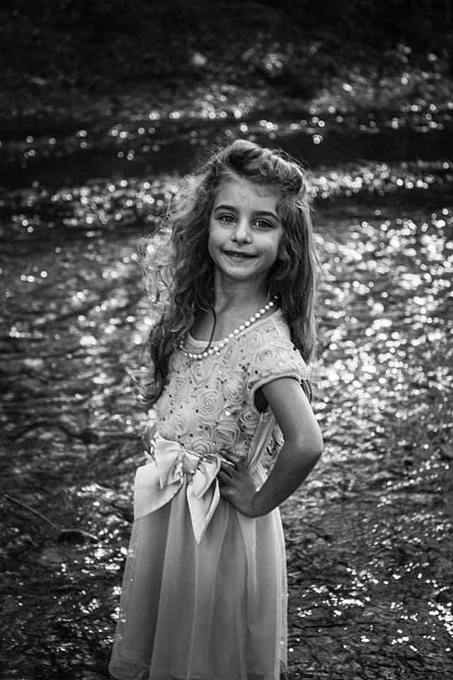 Tessa is registered to the contest to win money with this photo: black, day_dress, dress, fashion, flash_photography, forest, fun, grass, hair, hairstyle, happy, human_body, joy, monochrome, monochrome_photography, people_in_nature, person, plant, smile, standing