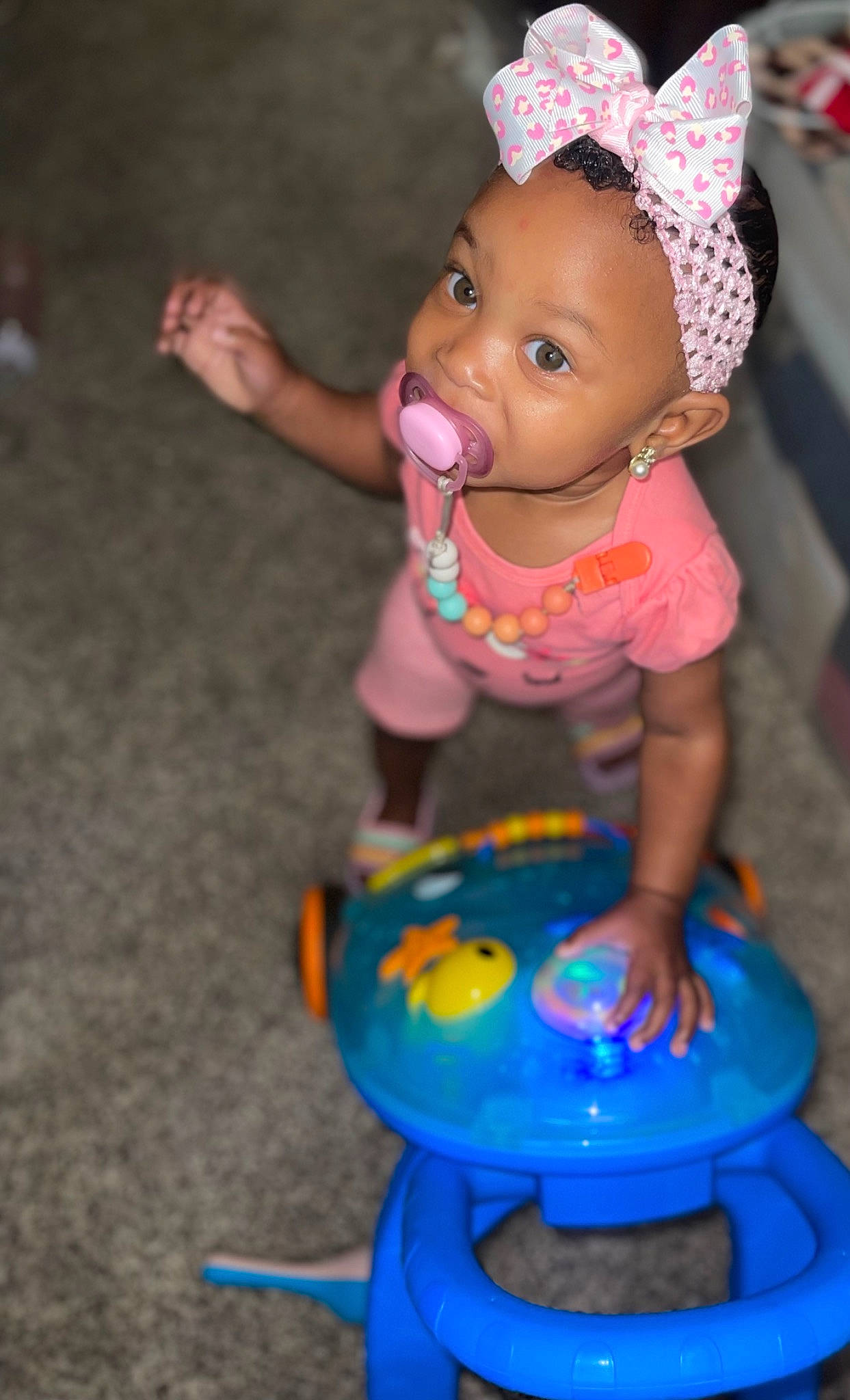 Royalty is registered to the contest to win money with this photo: baby, baby_products, baby_toddler_clothing, baby_toys, blue, cheek, child, doll, electric_blue, fashion_accessory, fun, gas, happy, magenta, party_supply, person, pink, plastic, recreation, toddler