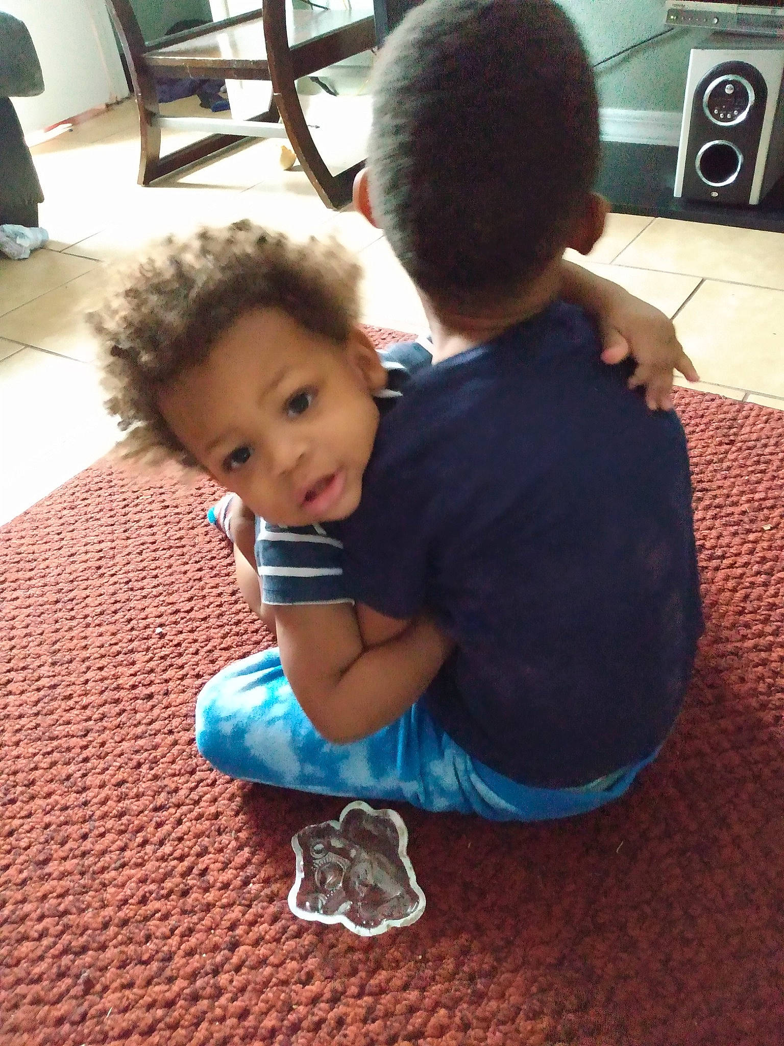 Knowledge is registered to the contest to win money with this photo: baby, baby_toddler_clothing, carpet, child, floor, flooring, home, home_appliance, human, kitchen_appliance, laundry_room, living_room, major_appliance, microwave_oven, person, play, shoe, toddler, walking_shoe, wood_flooring