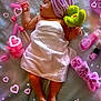 baby, beauty_accessories, blanket, clip, cute, green, hair_rollers, headband, hearts, indoors, infant, nail_polish, pink, plush_toy, purple, relaxing, sleeping, soft_toy, sparkles, towel