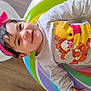 Penelope joined the competition — help win amazing prizes! baby, child, clothing, colorful, cute, face, floor, happy, headband, headwear, indoor, infant, infant_girl, person, playful, portrait, smile, tiger_toy, toy, winnie_the_pooh