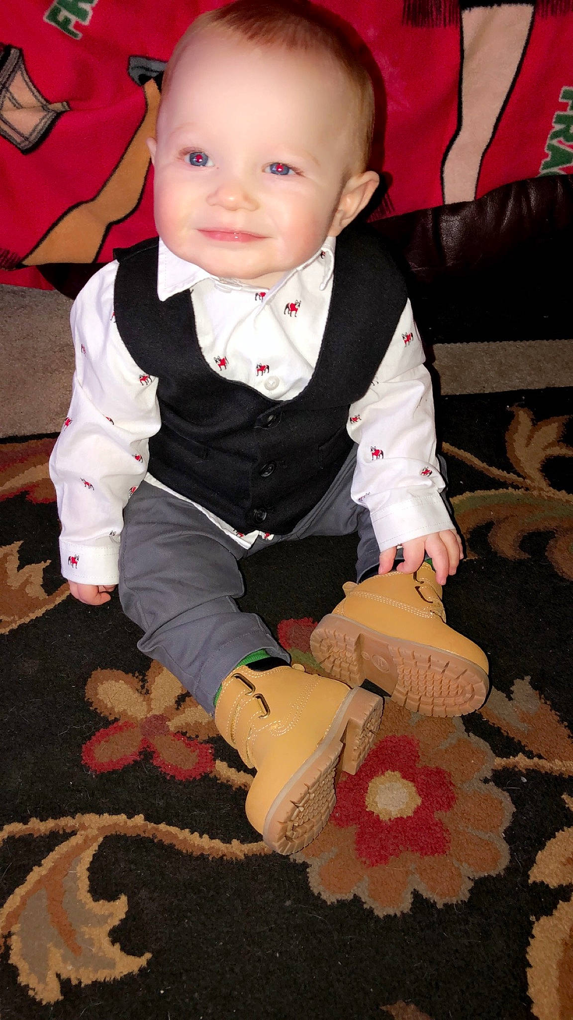 Avery is registered to the contest to win money with this photo: baby, baby_toddler_clothing, cheek, child, dress, face, flooring, formal_wear, fun, glove, happy, joy, pattern, person, pink, sitting, skin, sleeve, smile, sock